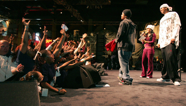 Carmelo Anthony, right, is greeted by fans at the Jordan Brand Experience at Sports Center Las Vegas February 16. Emceeing the event are actress Meagan Good and comedian Alex Thomas. 1500 Clark Co ...