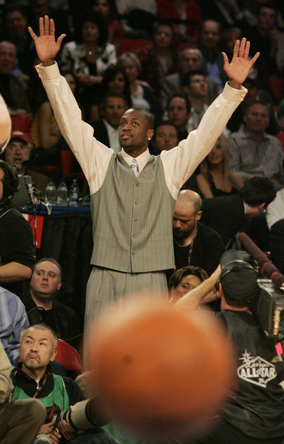 Dwyane Wade cheers as he watches Jason Kapono shoot during the NBA All-Star Three-Point Shootout at the Thomas & Mack Center in Las Vegas Saturday, Feb. 16, 2007. (John Locher/Las Vegas Review ...