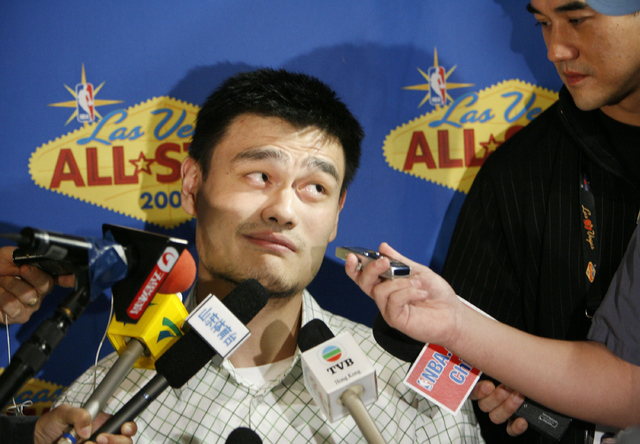 Yao Ming, from the Houston Rockets basketball team, speaks to the media at a news conference for the NBA All-Star weekend in Las Vegas, Nev., on Friday, Feb. 16, 2007. (AP Photo/Kevork Djansezian)