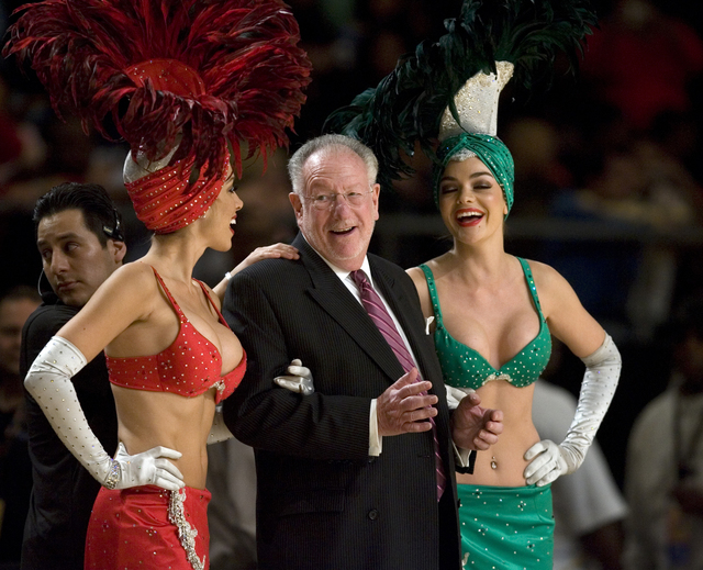 Mayor Oscar Goodman jokes with showgirls prior to being introduced during halftime festivities during the NBA All-Star Celebrity Game at Mandalay Bay Friday, Feb. 16, 2007. The West beat the East  ...