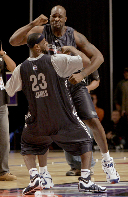Shaquille O'Neal of the Miami Heat and LeBron James from the Cleveland Cavaliers (23) dance together during NBA All-Star game basketball practice in Las Vegas, Saturday, Feb. 17, 2007. (AP Photo/K ...