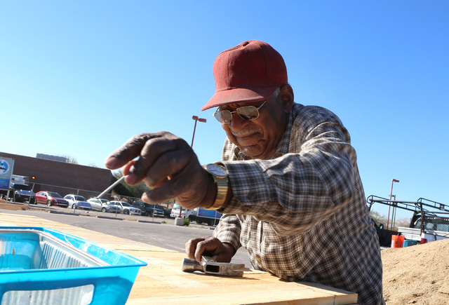 James Johnson, 80, volunteer at Zion Choice Neighborhood Community Garden Park builds garden plots on Wednesday, Feb. 1, 2017, in North Las Vegas. (Bizuayehu Tesfaye/Las Vegas Review-Journal) @biz ...