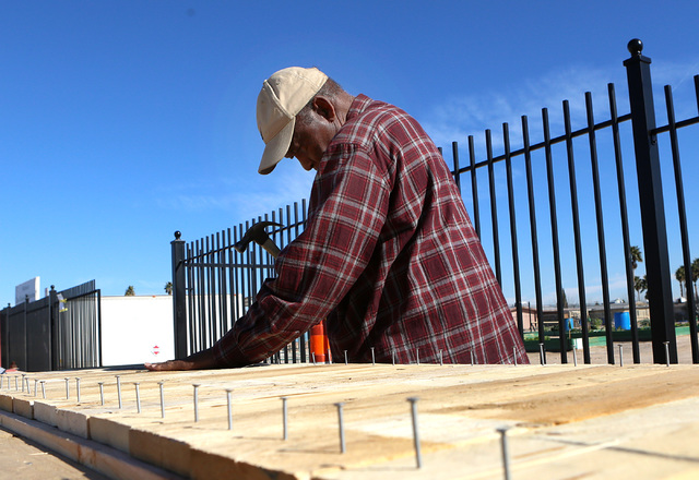 Harry Dodd, 77, volunteer at Zion Choice Neighborhood Community Garden Park builds garden plots on Wednesday, Feb. 1, 2017, in North Las Vegas. (Bizuayehu Tesfaye/Las Vegas Review-Journal) @bizute ...