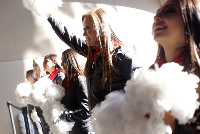UNLV cheerleader Courtney Dale cheers for participants before they begin the Scale the Strat stair climb that raises money for the American Lung Association on Sunday, Feb. 26, 2017, at the Strato ...
