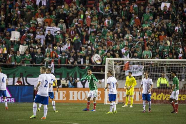 Teams was for play to resume during the men's soccer exhibition match between Mexico and Iceland at Sam Boyd Stadium on Wednesday, Feb. 8, 2017, in Las Vegas. Mexico won 1-0. (Erik Verduzco/Las Ve ...