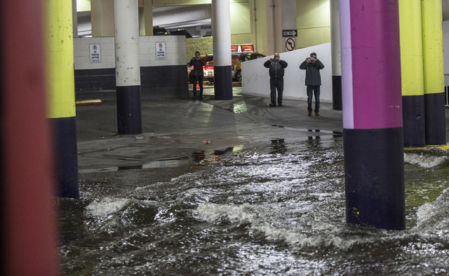 Heavy rains caused flooding in and around the parking lot of The LINQ hotel-casino on Saturday, Feb. 18, 2017, in Las Vegas. (Benjamin Hager/Las Vegas Review-Journal) @benjaminhphoto