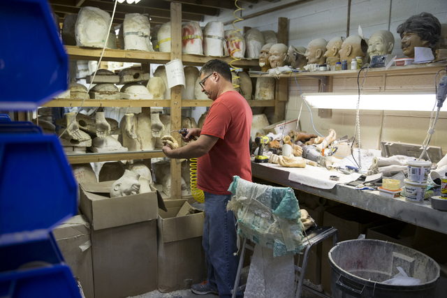 Tom Canterbury prepares character hands for paint at the Characters Unlimited workshop on Thursday, Feb. 2, 2017, in Boulder City. (Erik Verduzco/Las Vegas Review-Journal) @Erik_Verduzco
