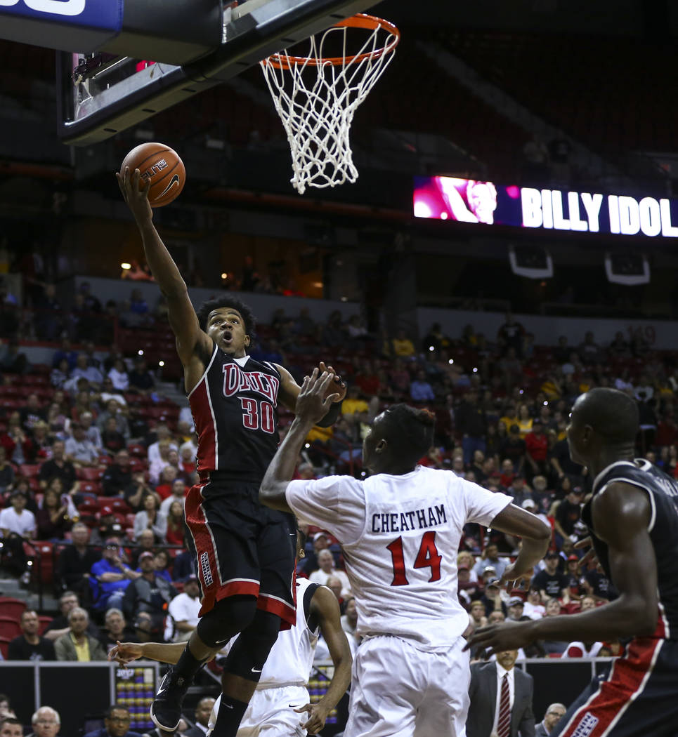 UNLV guard Jovan Mooring (30) goes to the basket over San Diego State during a Mountain West Conference tournament basketball game at the Thomas & Mack Center in Las Vegas on Wednesday, March  ...