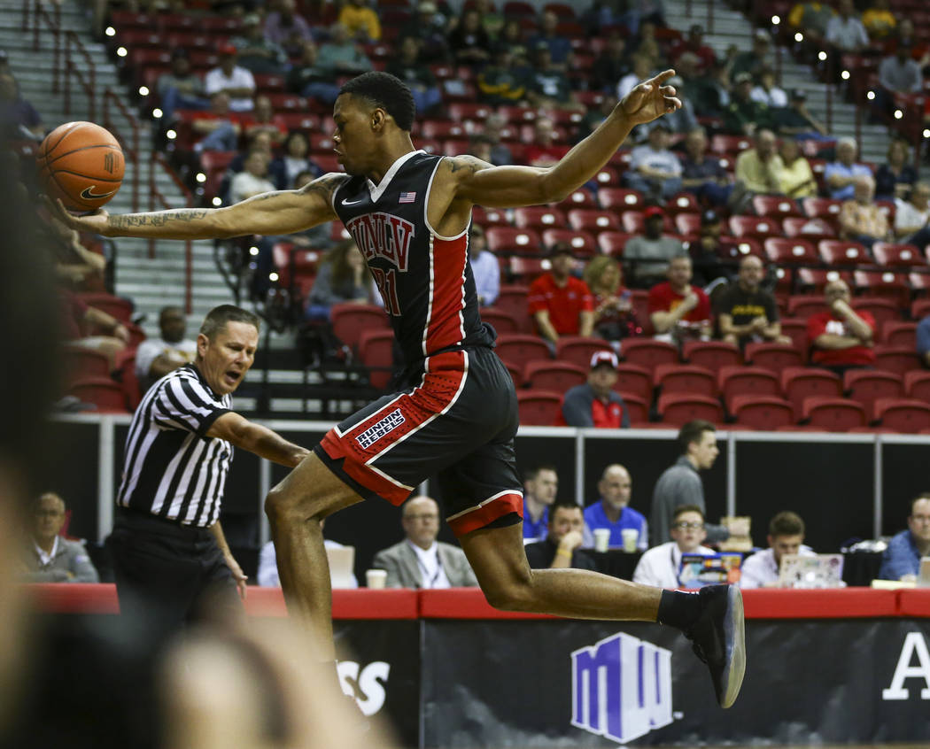 UNLV forward Troy Baxter Jr. (31) attempts to keep the ball in during a Mountain West Conference tournament basketball game against San Diego State at the Thomas & Mack Center in Las Vegas on  ...