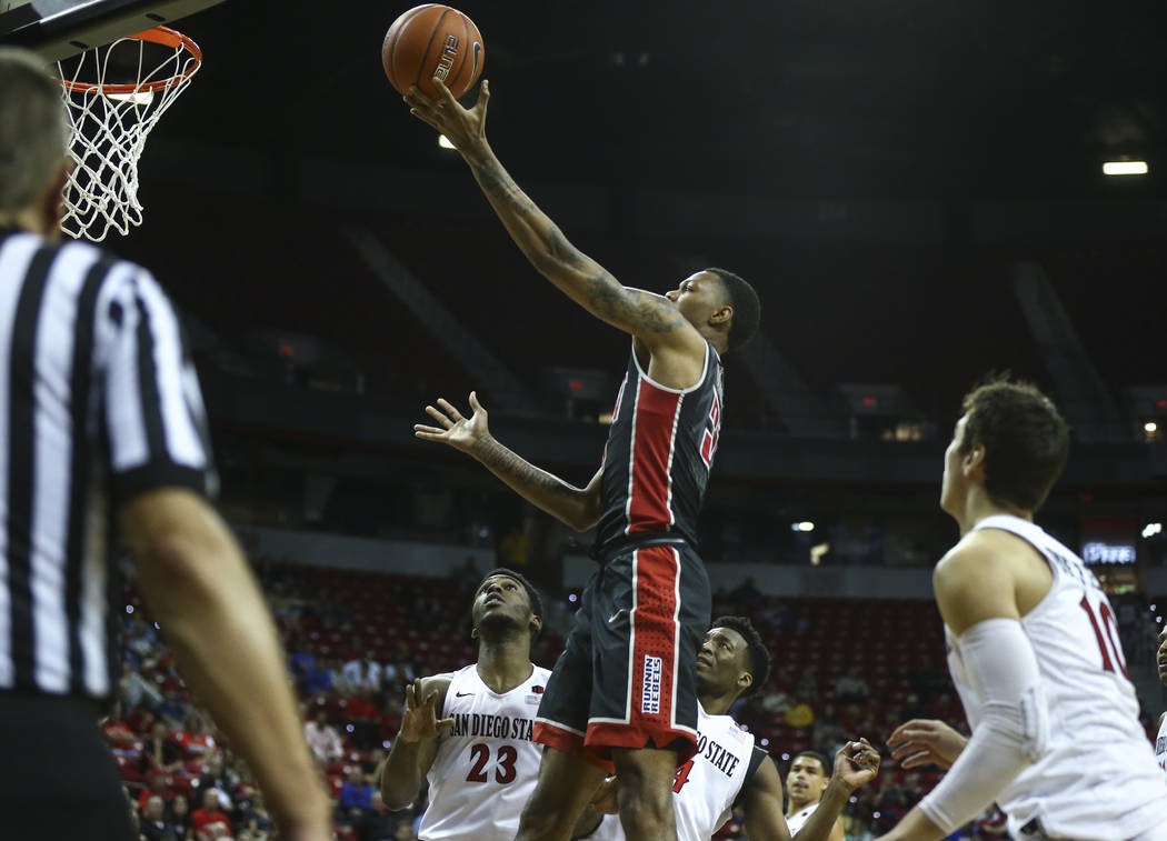 UNLV forward Troy Baxter Jr. (31) shoots over San Diego State during a Mountain West Conference tournament basketball game at the Thomas & Mack Center in Las Vegas on Wednesday, March 8, 2017. ...