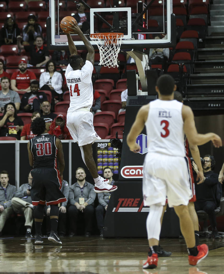 San Diego State forward Zylan Cheatham (14) goes in for a dunk against UNLV during a Mountain West Conference tournament basketball game at the Thomas & Mack Center in Las Vegas on Wednesday,  ...