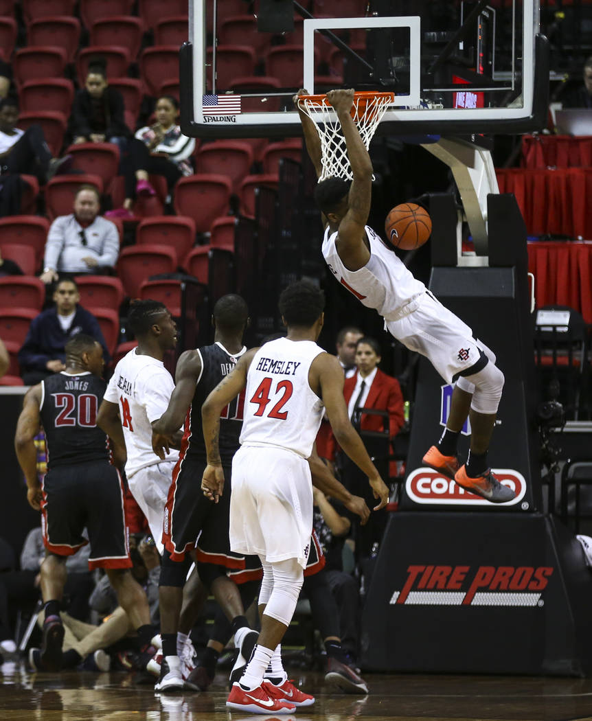 San Diego State forward Malik Pope (21) dunks against UNLV during a Mountain West Conference basketball game at the Thomas & Mack Center in Las Vegas on Wednesday, March 8, 2017. (Chase Steven ...