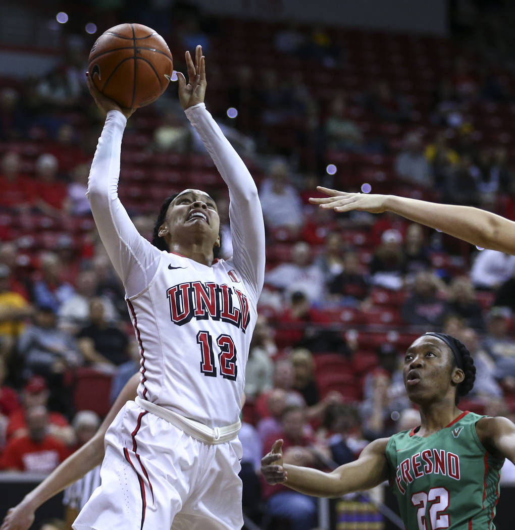 UNLV guard Dakota Gonzalez (12) shoots against Fresno State during the Mountain West Conference basketball tournament at the Thomas & Mack Center in Las Vegas on Wednesday, March 8, 2017. (Cha ...