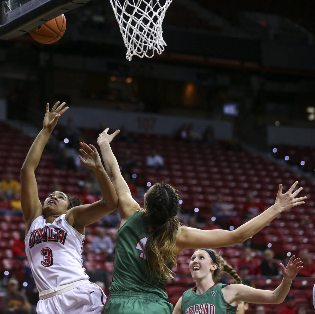 UNLV forward Paris Strawther (3) sends up a shot over Fresno State center Bego Faz Davalos (4) during the Mountain West Conference basketball tournament at the Thomas & Mack Center in Las Vega ...