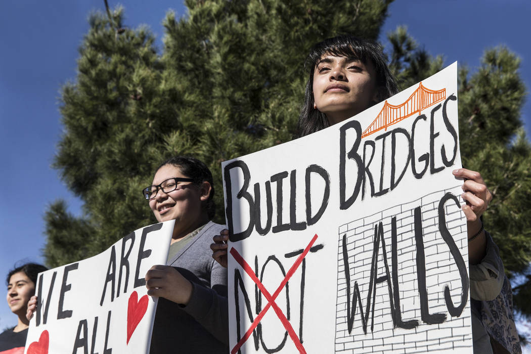 Erica Bonilla, right, stands with fellow students during a rally in support of the BRIDGE Act on Tuesday, March 7, 2017, outside Rancho High School, in Las Vegas. The BRIDGE Act would provide Drea ...