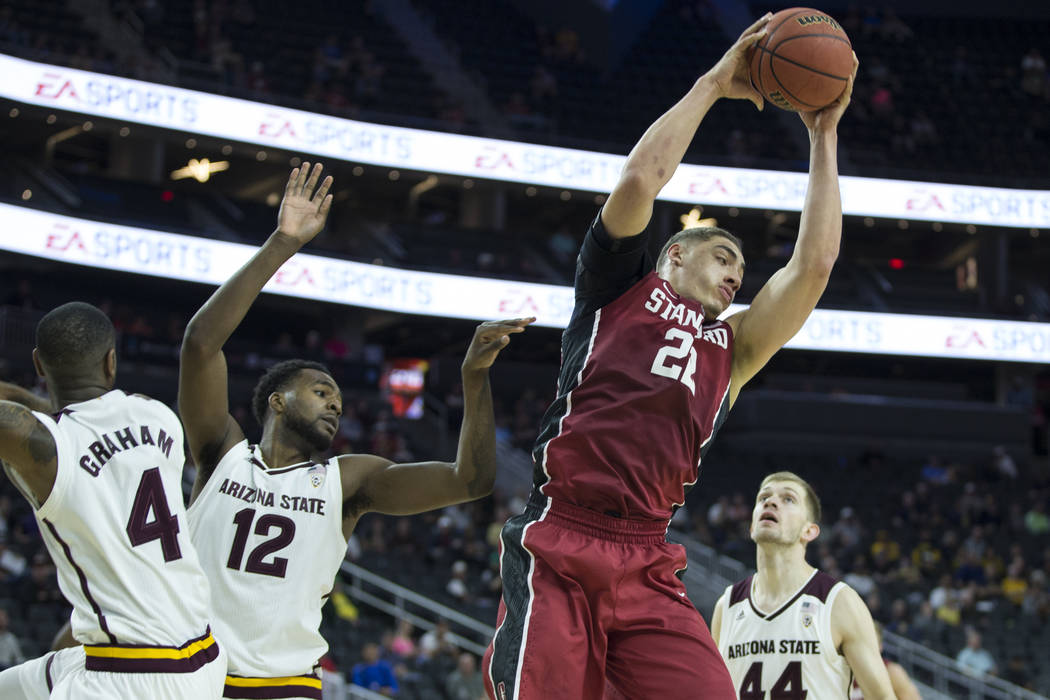 Stanford Cardinal forward Reid Travis (22) gets an offensive rebound against Arizona State Sun Devils in the Pac-12 Men's Basketball Tournament game at T-Mobile Arena on Wednesday, March 8, 2017,  ...