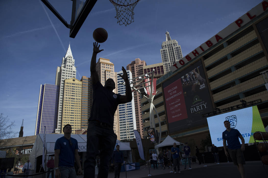 Tyrone Walker during a basketball challenge at Toshiba Plaza outside of T-Mobile Arena during the Pac-12 Men's Basketball Tournament on Wednesday, March 8, 2017, in Las Vegas. (Erik Verduzco/Las V ...