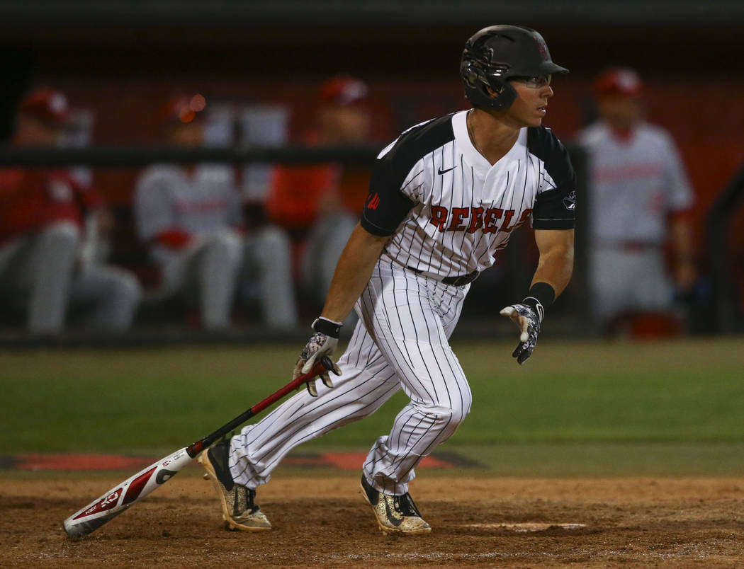 UNLV infielder Justin Jones (2) hits a single against New Mexico during a baseball game at Wilson Stadium in Las Vegas on Friday, March 24, 2017. (Chase Stevens/Las Vegas Review-Journal) @cssteven ...