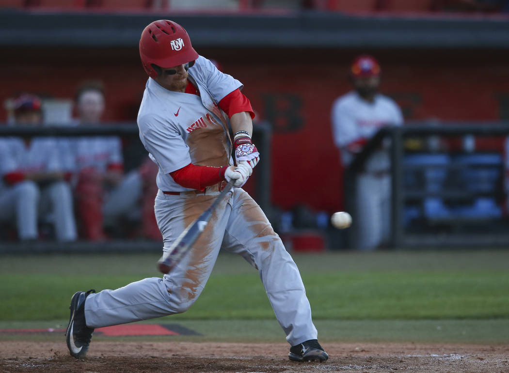 New Mexico outfielder Jared Mang (15) swings at a pitch from UNLV's Alan Strong (16) during a baseball game at Wilson Stadium in Las Vegas on Friday, March 24, 2017. (Chase Stevens/Las Vegas Revie ...