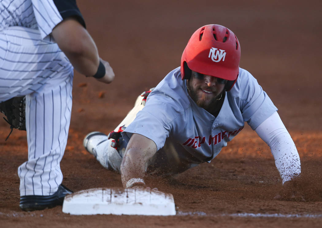 New Mexico outfielder Luis Gonzalez (27) returns to first base to avoid getting picked off by UNLV during a baseball game at Wilson Stadium in Las Vegas on Friday, March 24, 2017. (Chase Stevens/L ...