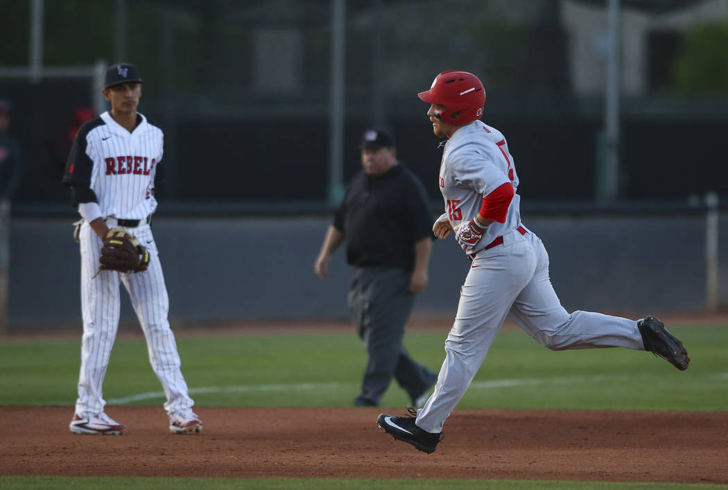 New Mexico outfielder Jared Mang (15) rounds the bases on his home run hit against UNLV during a baseball game at Wilson Stadium in Las Vegas on Friday, March 24, 2017. (Chase Stevens/Las Vegas Re ...