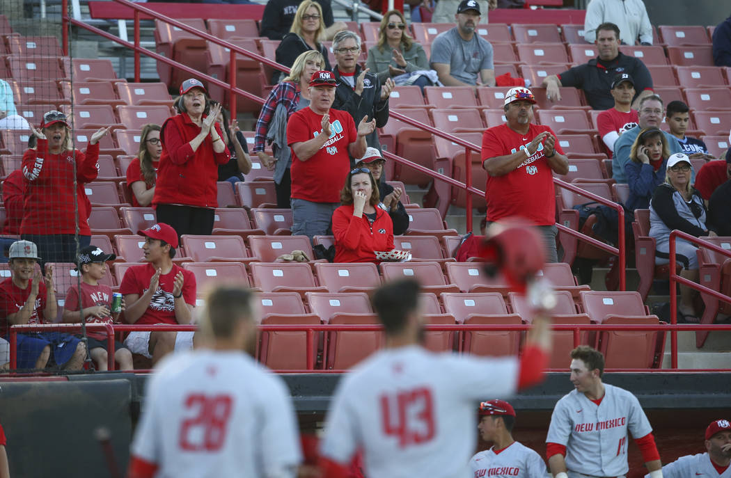 New Mexico fans celebrate as their team plays UNLV during a baseball game at Wilson Stadium in Las Vegas on Friday, March 24, 2017. (Chase Stevens/Las Vegas Review-Journal) @csstevensphoto