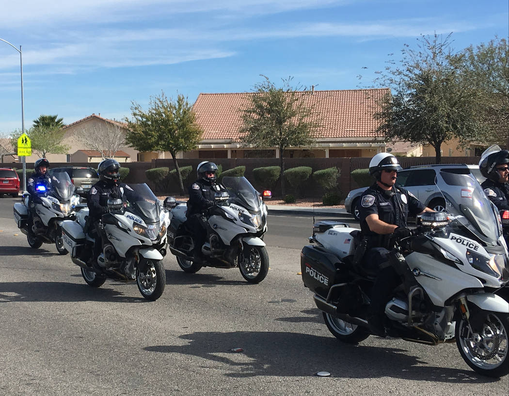 North Las Vegas patrol participates in a parade in memory of North Las Vegas fallen officer Raul P. Elizondo in North Las Vegas, Wednesday, March 8, 2017. Officer Elizondo was shot and killed in 1 ...