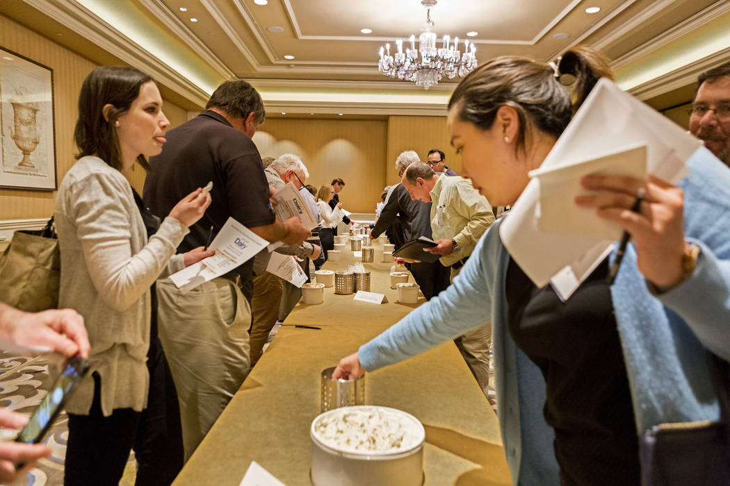 Attendees of the Ice Cream Technology Conference, sample ice cream flavors apart of an innovative flavor contest during the convention at the Hilton Lake Las Vegas Resort & Spa, Henderson, Tue ...