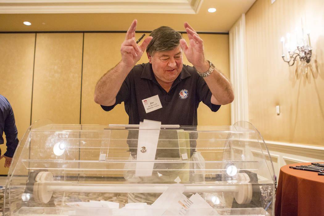 Jon Beckwith, attendee of the Ice Cream Technology Conference, casts his vote after sampling ice cream flavors apart of an innovative flavor contest during the convention at the Hilton Lake Las Ve ...