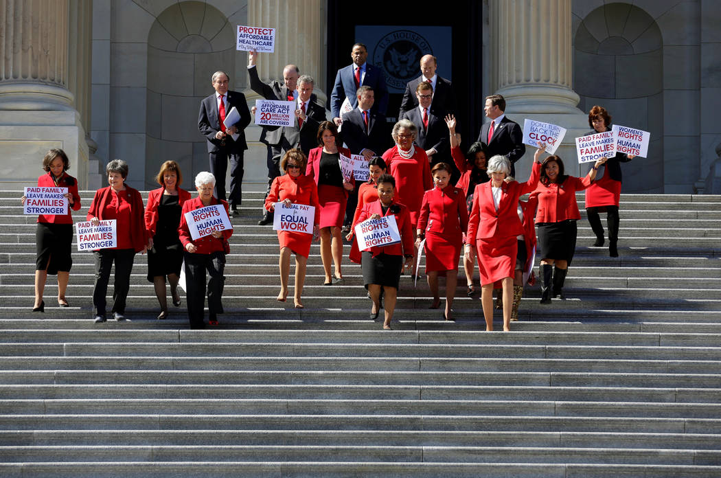 Democratic women in Congress arrive for a rally during the Day Without a Woman on International Women's Day at the U.S. Capitol in Washington, U.S., March 8, 2017. (Joshua Roberts/Reuters)