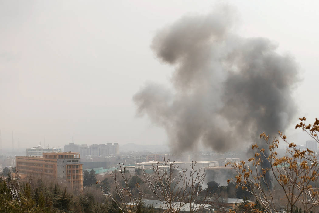 Smoke rises from a military hospital area at the site of blast and gunfire in Kabul, Afghanistan March 8, 2017. (Mohammad Ismail/Reuters)
