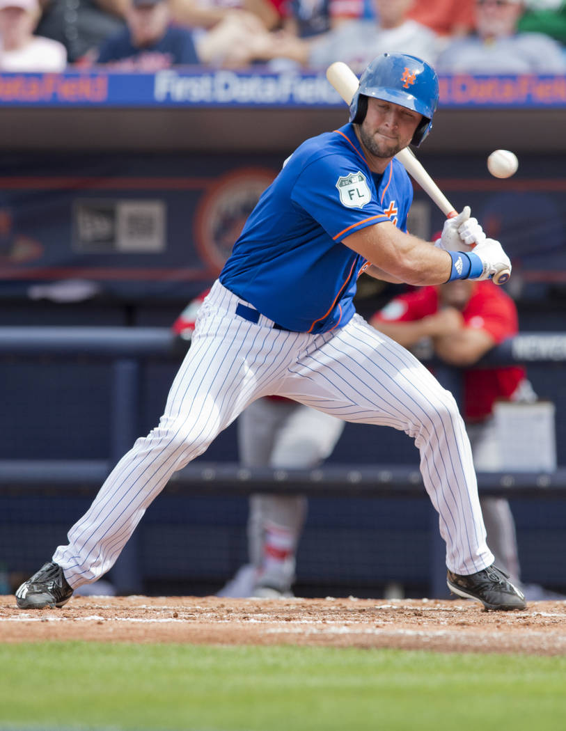New York Mets designated hitter Tim Tebow lets a pitch go by during his second at-bat in the team's spring training baseball game against the Boston Red Sox on Wednesday, March 8, 2017, in Port St ...