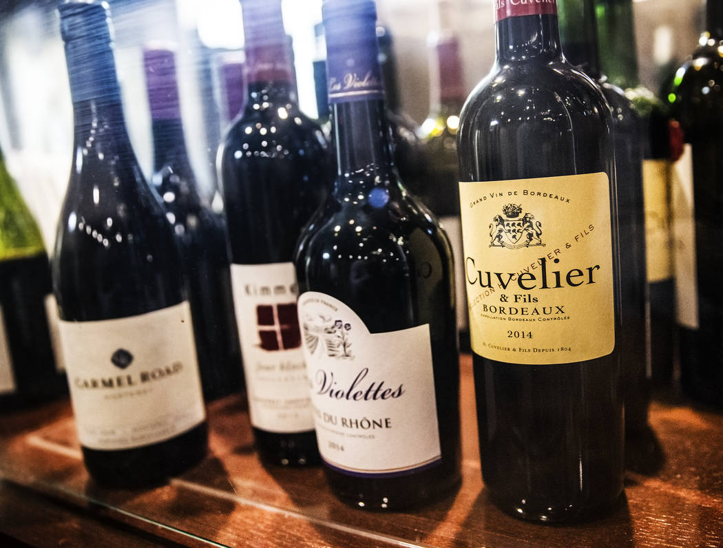 A bottle of 2014 Cuvelier Bordeaux, right, at Ohlala French Bistro on Wednesday, March 15, 2017, in Las Vegas. (Benjamin Hager/Las Vegas Review-Journal) @benjaminhphoto