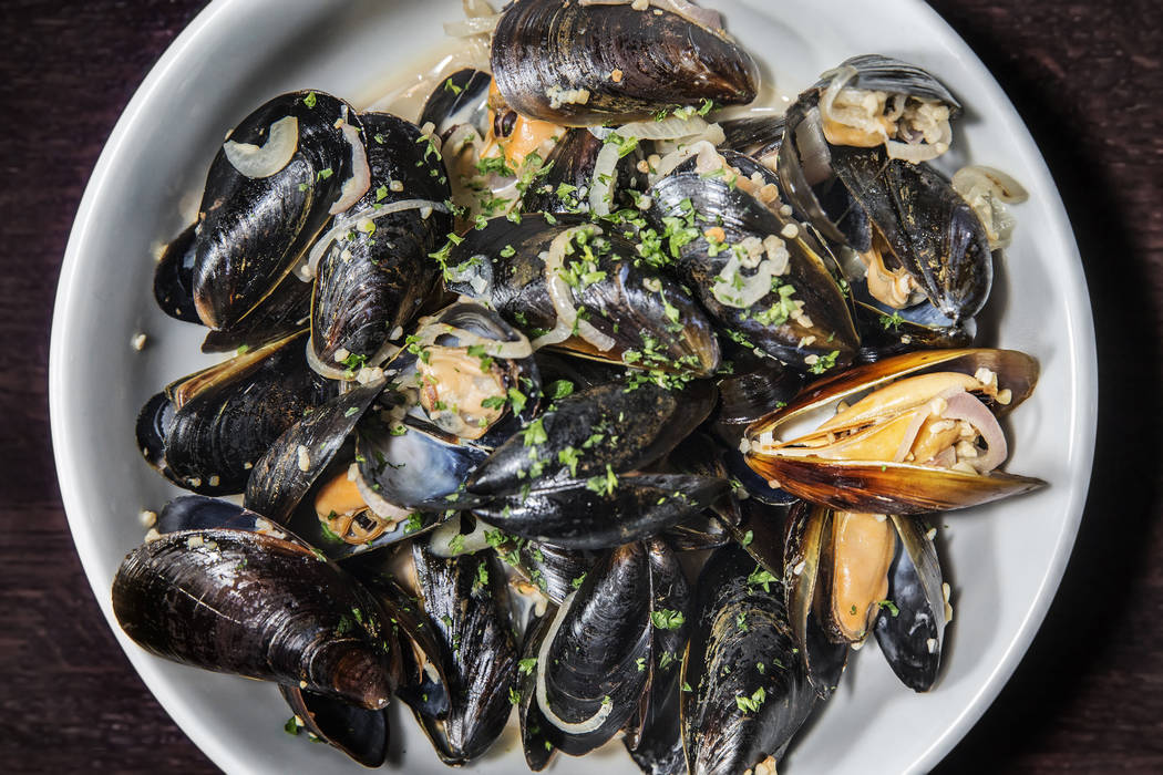The moules mariniere, right, at Ohlala French Bistro on Wednesday, March 15, 2017, in Las Vegas. (Benjamin Hager/Las Vegas Review-Journal) @benjaminhphoto