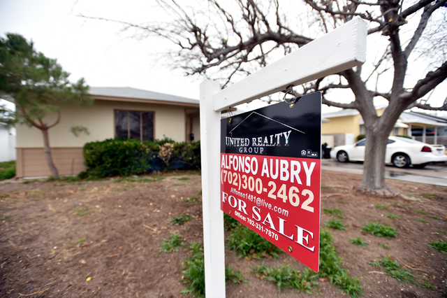 A for sale sign is displayed in front of a downtown home Tuesday, Jan. 19, 2016, in Las Vegas. (David Becker/Las Vegas Review-Journal)