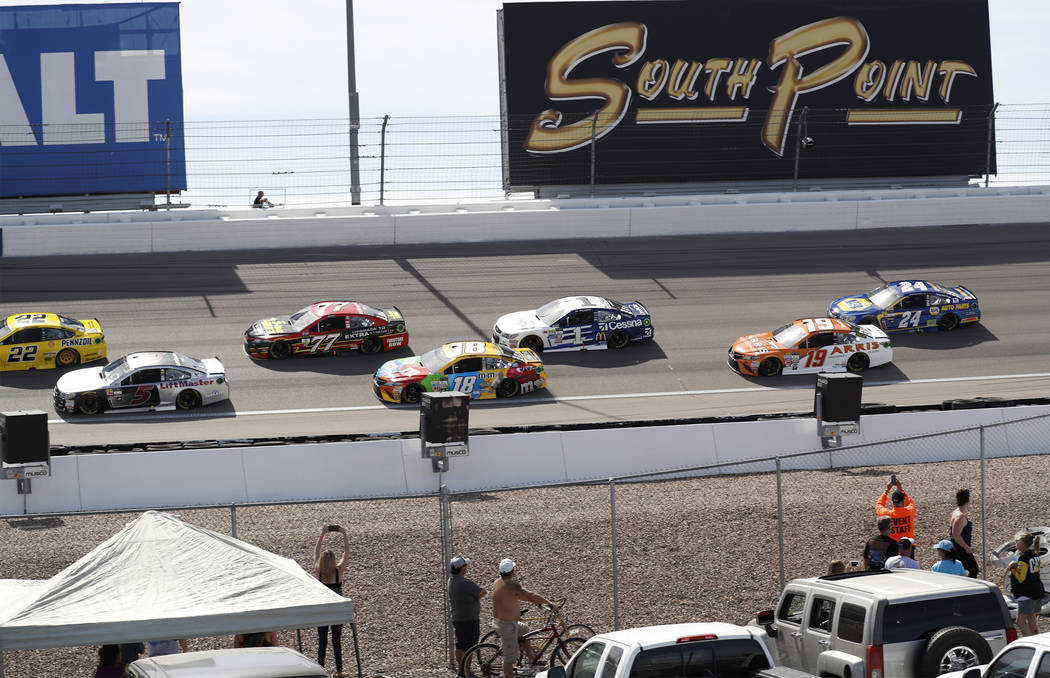 Fans watch the Monster Energy NASCAR Cup Series Kobalt 400 auto race  at Las Vegas Motor Speedway in Las Vegas, Sunday, March 12, 2017. (Miranda Alam  /Las Vegas Review-Journal)
