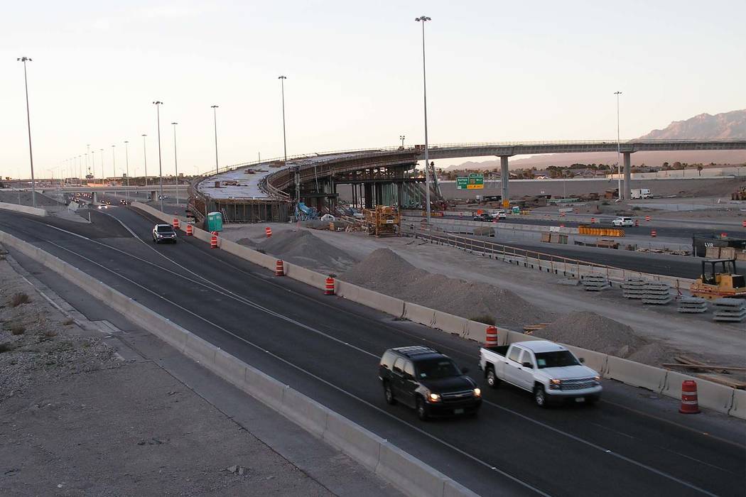 Vehicles travel south on U.S. Highway 95 through construction at the Centennial Bowl, an interchange under construction at the northern I-215 beltway in Las Vegas on Monday, March 13, 2017. (Greg  ...