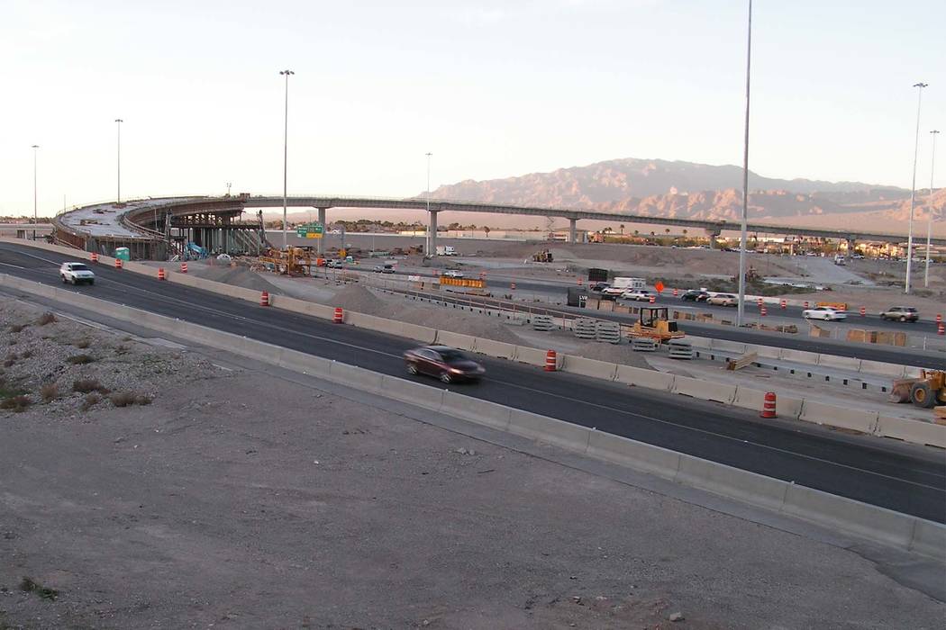 Cars proceed south on U.S. Highway 95 through construction at the Centennial Bowl, an interchange under construction at the northern I-215 beltway in Las Vegas on Monday, March 13, 2017. The flyov ...