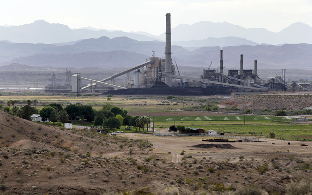 The Reid-Gardner power generating station is seen near a farm on the Moapa Indian Reservation in Moapa, May 14, 2012. (Julie Jacobson/AP)