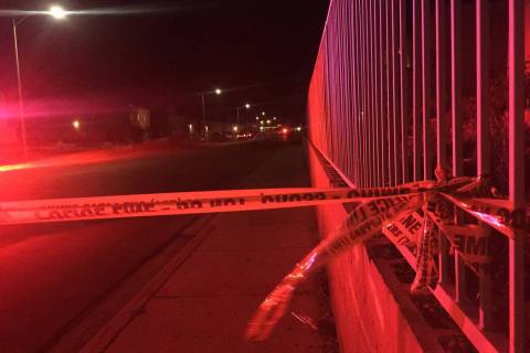 Las Vegas police investigate a shooting on the 6900 block of Issac Drive, near Lake Mead and Ho ...