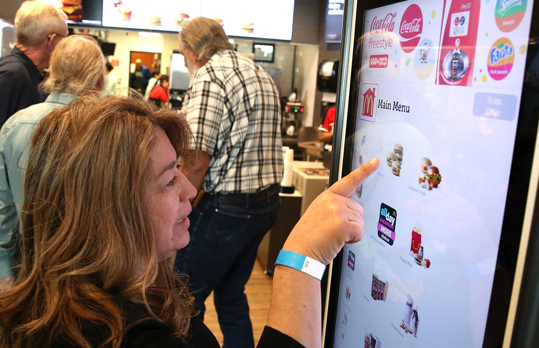 Pat Issel places her order at a self-service kiosk at McDonald's restaurant on Sunset Road and Durango Drive on Wednesday, March 22, 2017, in Las Vegas. The store will be the first McDonaldճ ...