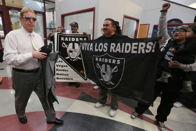 Oakland Raiders owner Mark Davis walks past fans during a Southern Nevada Tourism Infrastructure Committee meeting at UNLV in Las Vegas on Thursday, April 28, 2016. (Brett Le Blanc/Las Vegas Revie ...