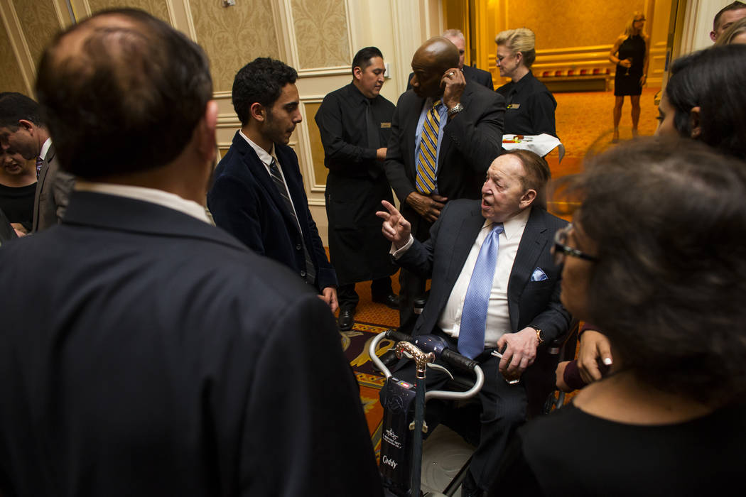 Las Vegas Sands Corp. Chairman and CEO Sheldon Adelson, right, talks with Kevin Larian during the Adelson Educational Campus' 13th annual In Pursuit of Excellence Gala at The Venetian hotel-casino ...