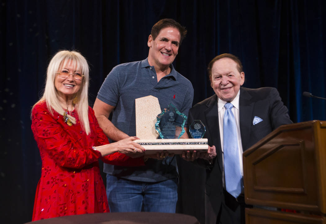 Entrepreneur Mark Cuban, center, poses with Dr. Miriam Adelson and Las Vegas Sands Corp. Chairman and CEO Sheldon Adelson during the Adelson Educational Campus' 13th annual In Pursuit of Excellenc ...