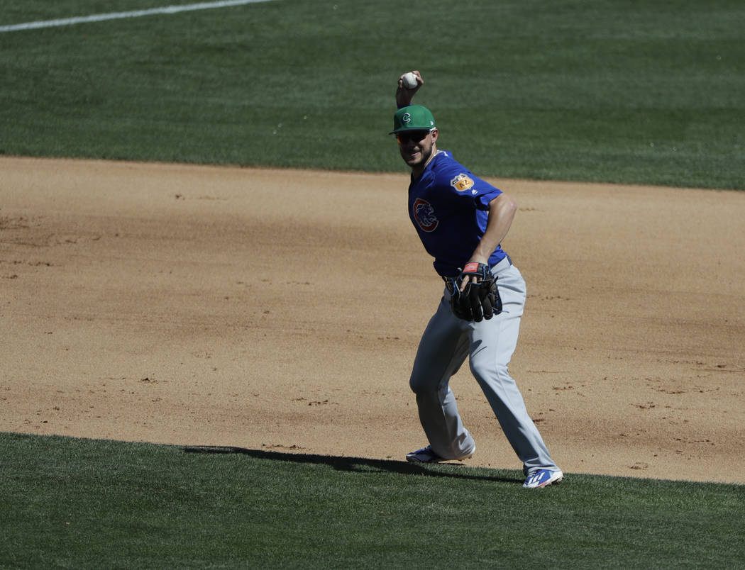 Chicago Cubs' Kris Bryant throws during a spring training baseball game against the Chicago White Sox, Friday, March 17, 2017, in Phoenix. (AP Photo/Darron Cummings)