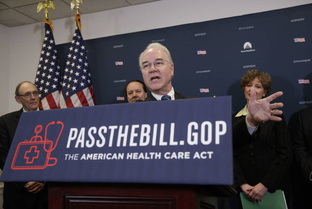 Health and Human Services Secretary Tom Price, center, joined by, from left, Rep. Phil Roe, R-Tenn., Rep. Pat Tiberi, R-Ohio, and Rep. Susan Brooks, R-Ind., speaks during a news conference on Capi ...