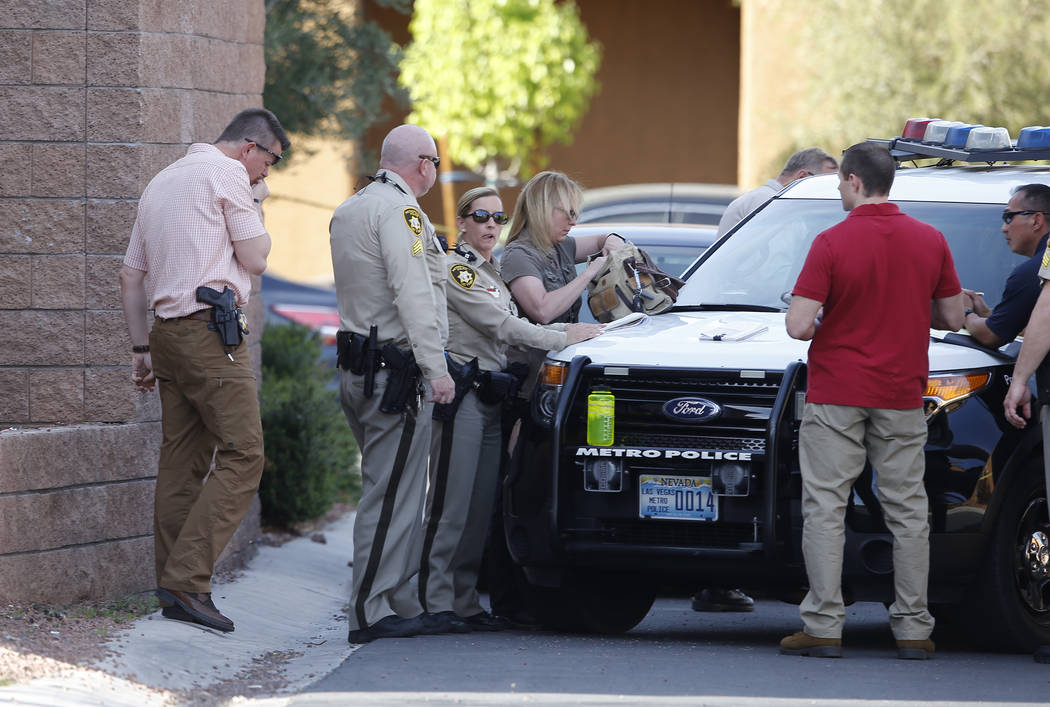Las Vegas Metropolitan police officers are investigating a shooting near the 10200 block of Yarmouth Sea Ct. on Friday, March 17, 2017, in Las Vegas. (Christian K. Lee/Las Vegas Review-Journal) @c ...