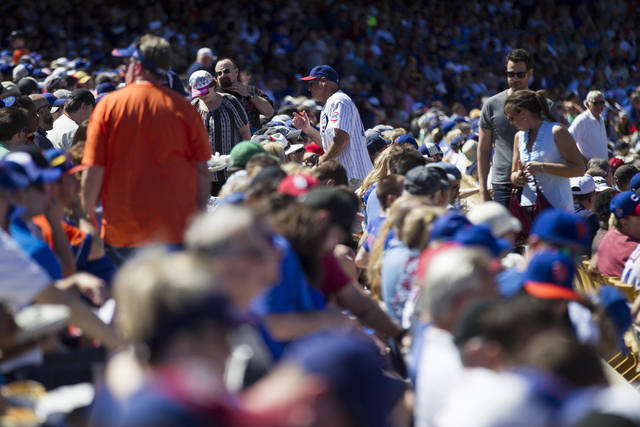 Fans watch the Chicago Cubs play against the New York Mets in their baseball game during Big League Weekend at Cashman Field on Friday, March 1, 2016, in Las Vegas. The Mets won 8-1. Erik Verduzco ...