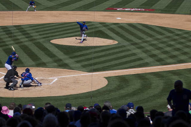 Fans watch the Chicago Cubs play against the New York Mets in their baseball game during Big League Weekend at Cashman Field on Friday, March 1, 2016, in Las Vegas. The Mets won 8-1. Erik Verduzco ...