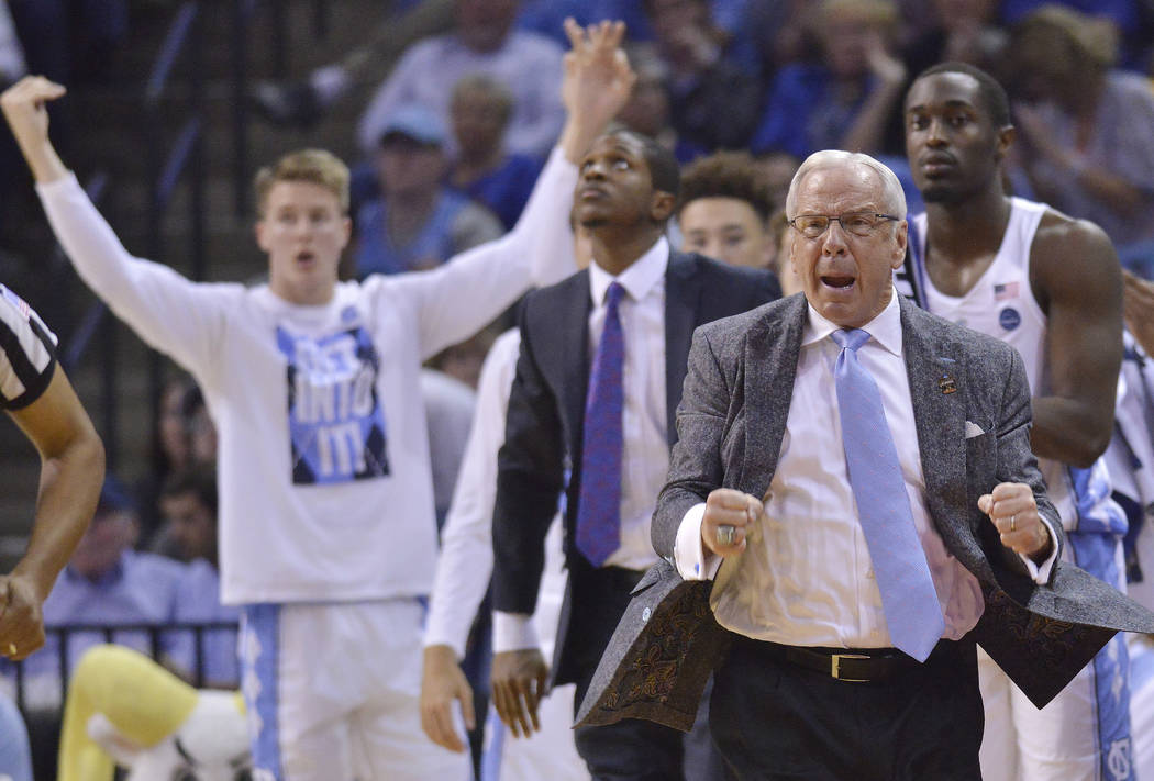 North Carolina head coach Roy Williams reacts to play against Butler in the second half of an NCAA college basketball tournament South Regional semifinal game Friday, March 24, 2017, in Memphis, T ...